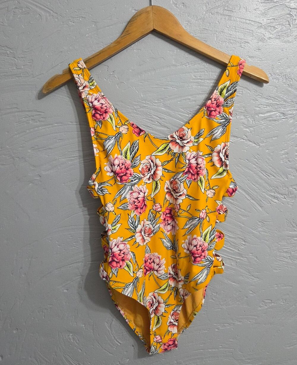 Xhilaration orange floral one piece swim suit with open crisscross sides Size M